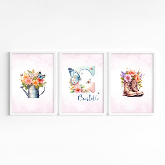 three frames featuring the artwork for kids pink garden floral with personalised name and initial